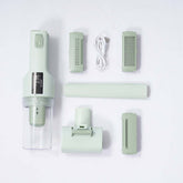 Portable pet grooming vacuum for dogs and accessories including brushes, combs, and data cable.