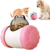 Juguete dispensador de premios interactivo en rosa con un gato y un perro jugando, para comer despacio y entretenerse.