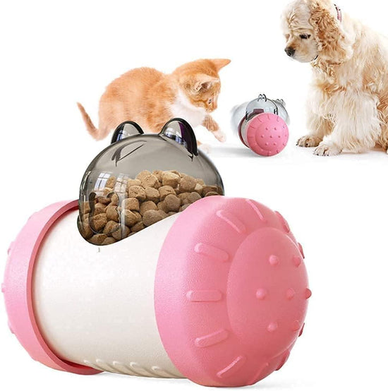 Juguete dispensador de premios interactivo en rosa con un gato y un perro jugando, para comer despacio y entretenerse.