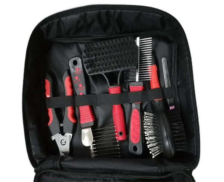 Portable pet cleaning kit with 9 hygiene accessories in a black case, featuring red and black grooming tools for dogs and cats.