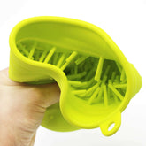 Interior view of a portable dog paw cleaner with soft bristles for easy paw washing.