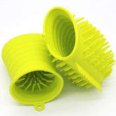 Portable dog paw cleaner in bright yellow, designed for easy pet paw washing and cleanliness.