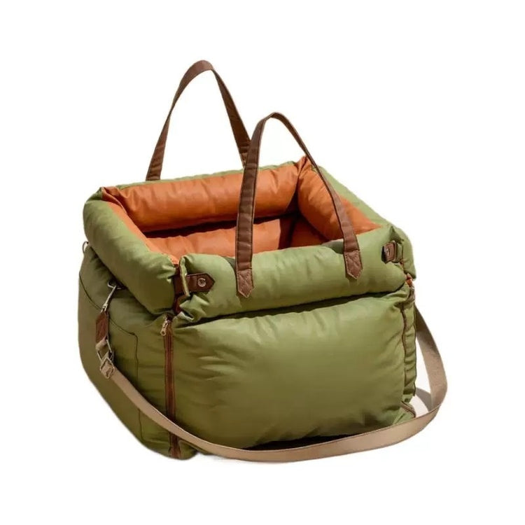 waterproof pet car seat cover in green with tan straps and orange lining