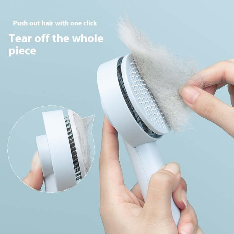 Close-up of a pet detangling comb for dogs and cats with hair being removed effortlessly.