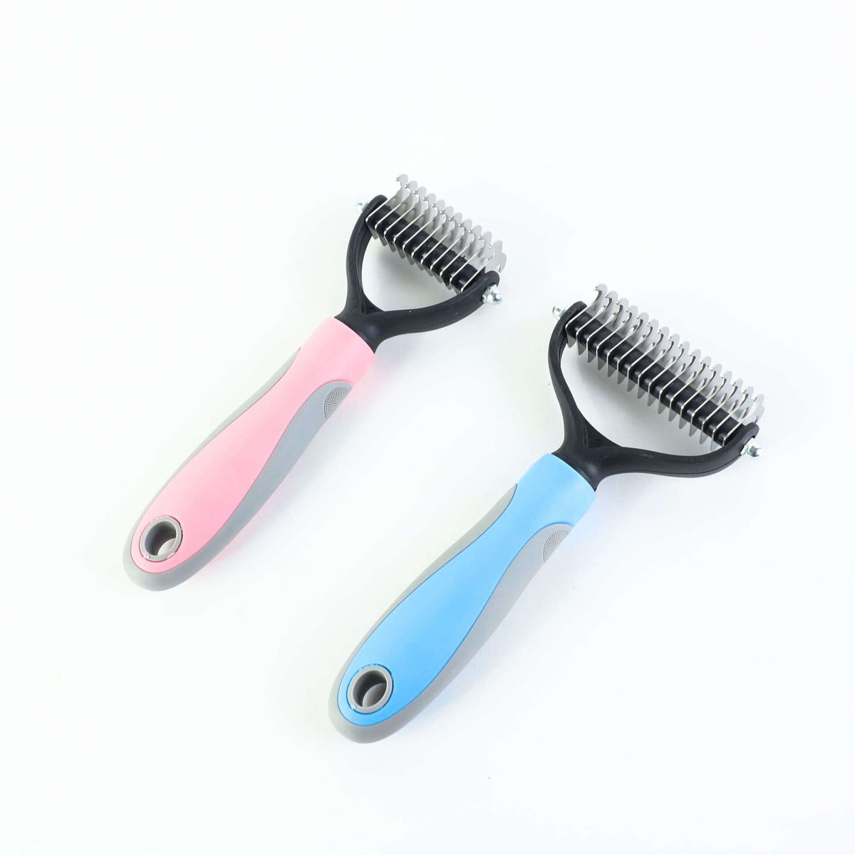 Double-sided pet brush for shedding in pink and blue colors, designed for effective hair removal from pets.