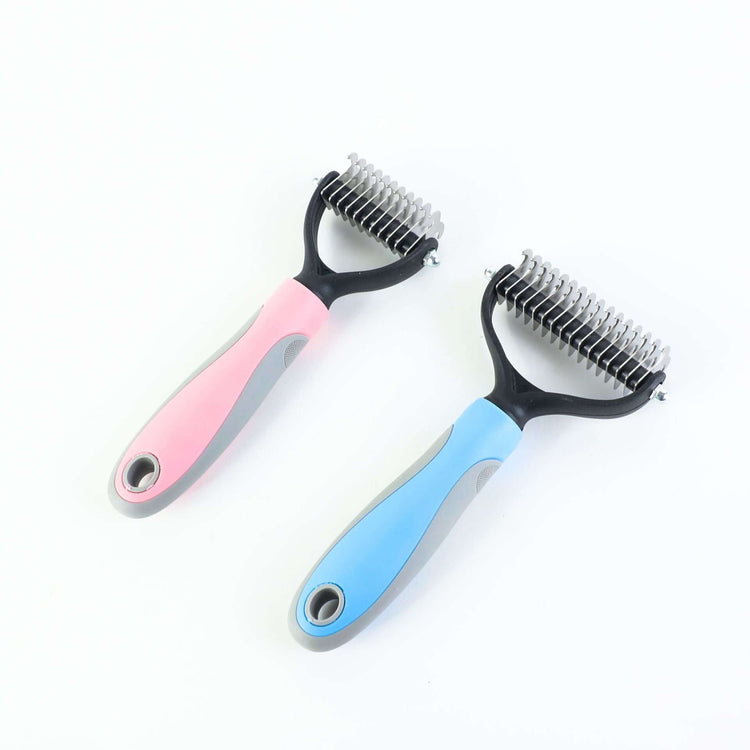 Double-sided pet brush for shedding in pink and blue colors, designed for effective hair removal from pets.