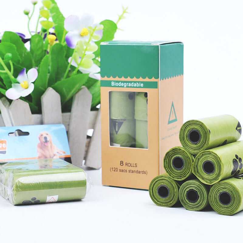 Hygienic dog poop bags in rolls with a biodegradable box, ideal for pet waste management.
