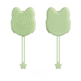 Guante de baño de silicona para mascotas en color verde con cerdas suaves para el aseo y el masaje.