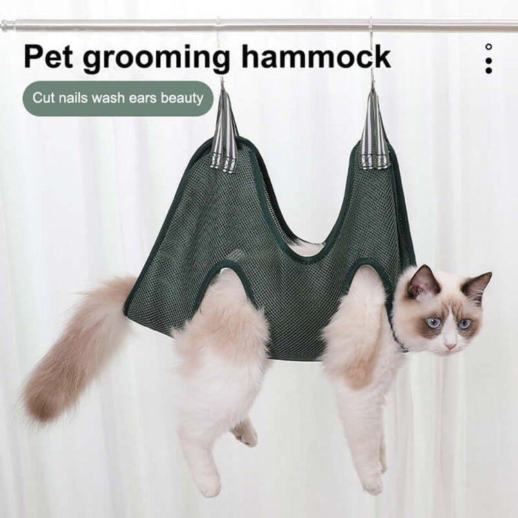 grooming hammock harness for pets, comfortable and safe cat grooming tool in use.