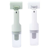Portable pet grooming vacuum for dogs in green and white, designed for easy pet hair removal.