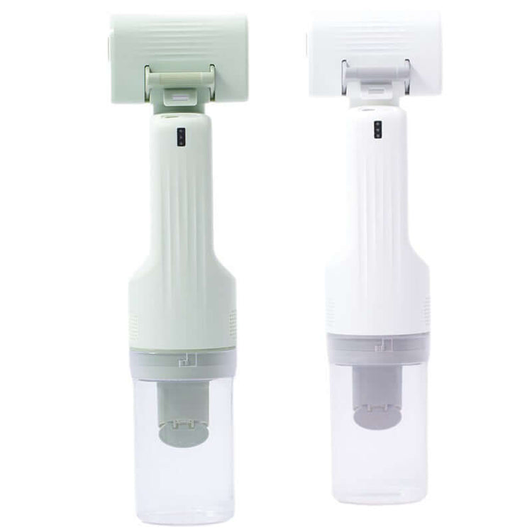 Portable pet grooming vacuum for dogs in green and white, designed for easy pet hair removal.