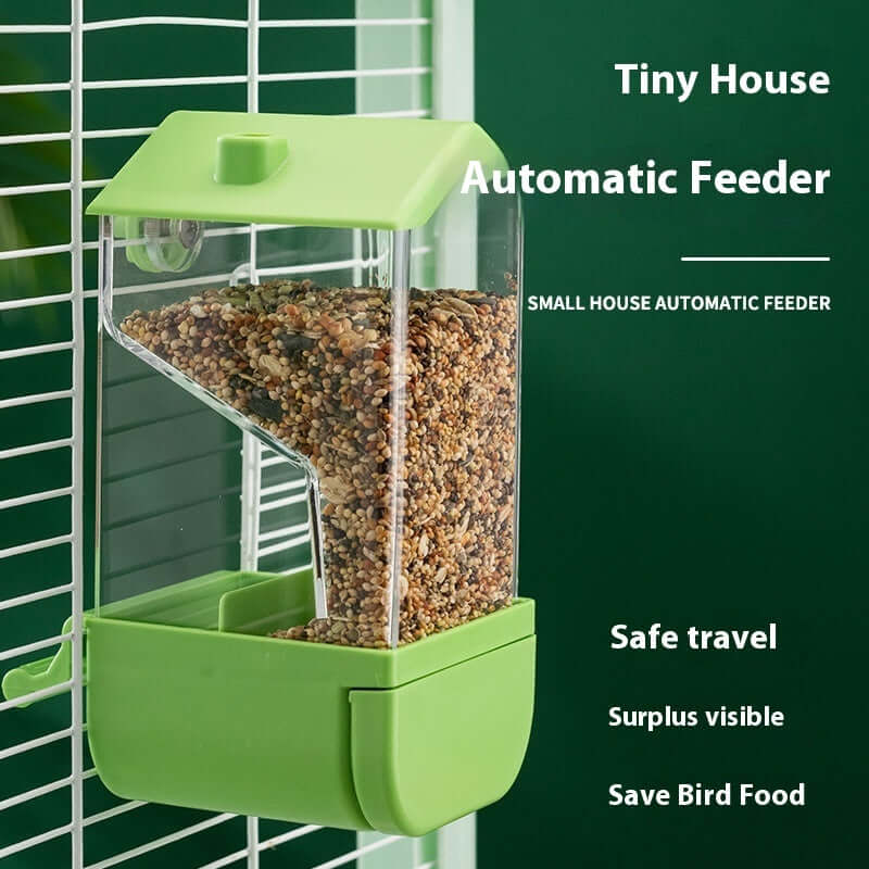Automatic feeder for parrots showcasing a green plastic and acrylic food dispenser for pet birds.
