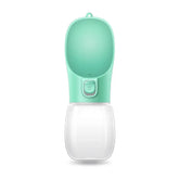 Leakproof portable dog water bottle in mint green color, ideal for hydrating pets on outdoor adventures.