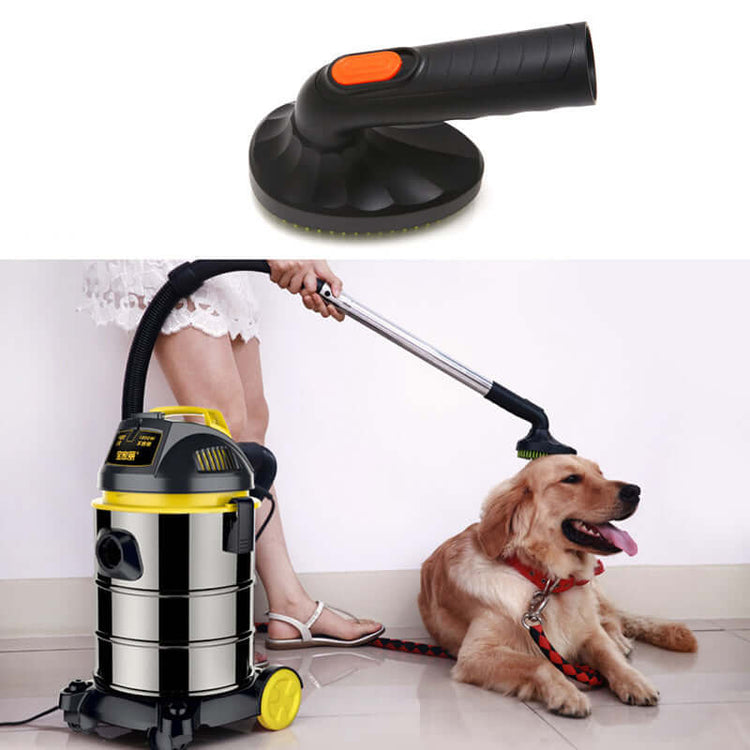 Pet grooming brush vacuum attachment in use with vacuum cleaner and a golden retriever dog.