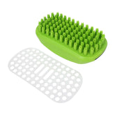 Green dog grooming and cleaning tools, featuring a bath brush and a protective mat for effective pet hygiene.
