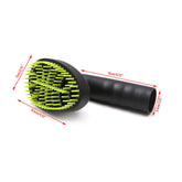 Pet grooming brush vacuum attachment with ergonomic handle and soft bristles, designed for easy pet hair removal.