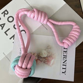 Interactive pet chew toy for dogs and cats, pink and blue cotton rope knot toy.