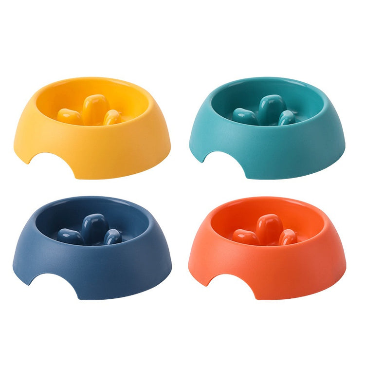 Comedero lento de colores para perros en amarillo, naranja, turquesa y azul marino, diseñado para evitar que coman demasiado rápido.