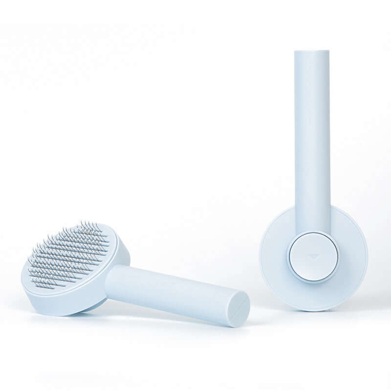 Pin Comb Hair Remover for Dogs and Cats - pet detangling comb for dogs and cats design with cleaning button.